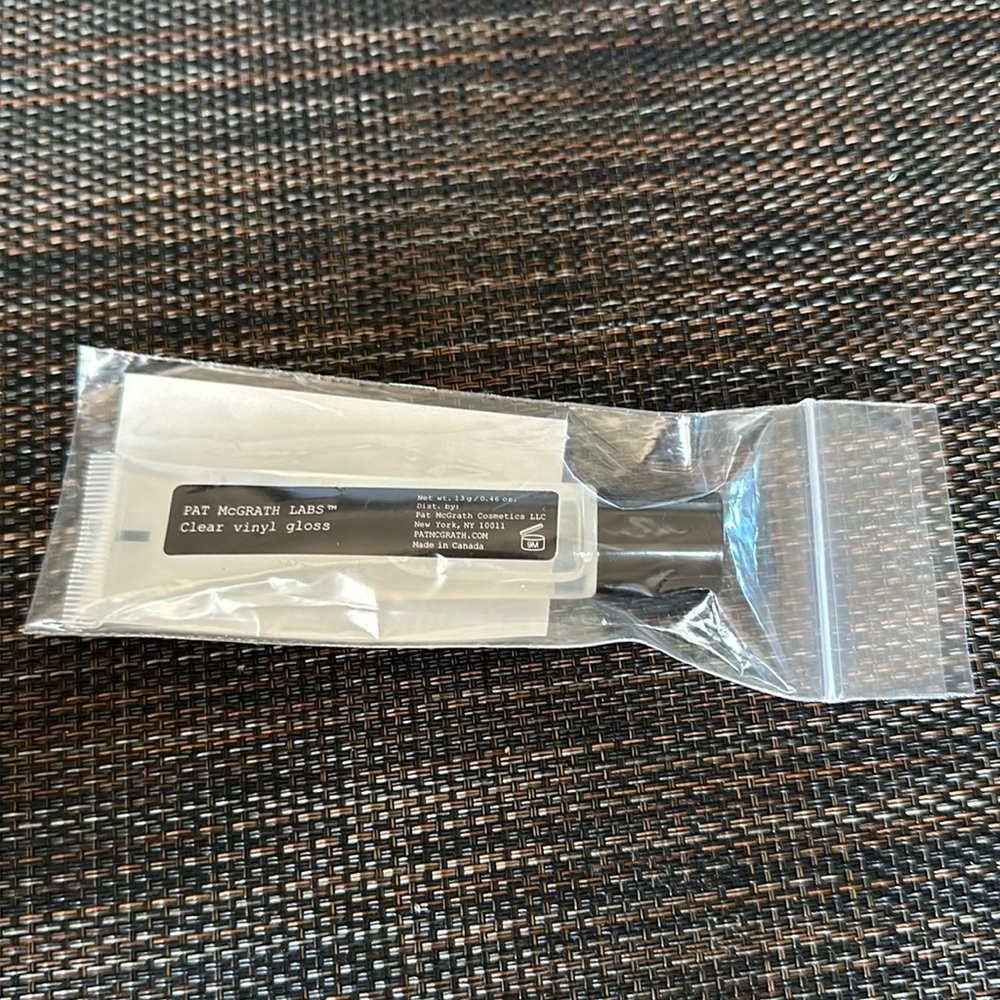 Pat McGrath labs clear vinyl lipgloss.